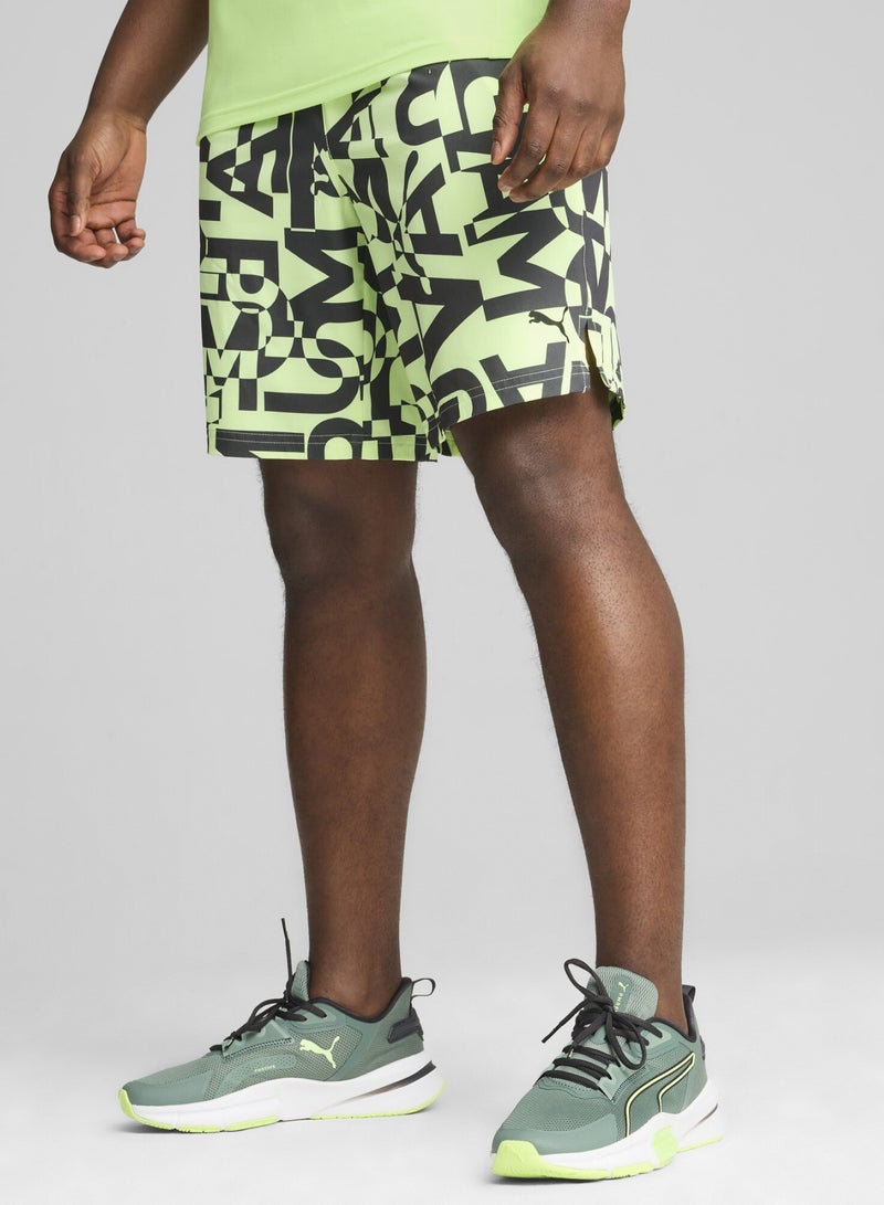 PUMA 7" Graphic Stretch Mens Green Woven Shorts - Image 1
